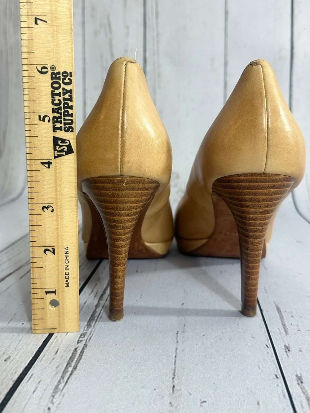 Cole Haan Chelsea pumps featuring a stacked heel and tan leather women’s size 9B